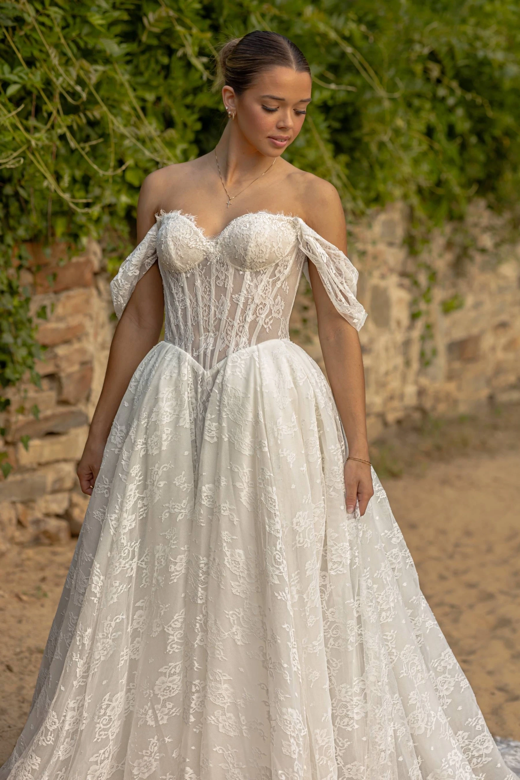 Model wearing a white dress 2024