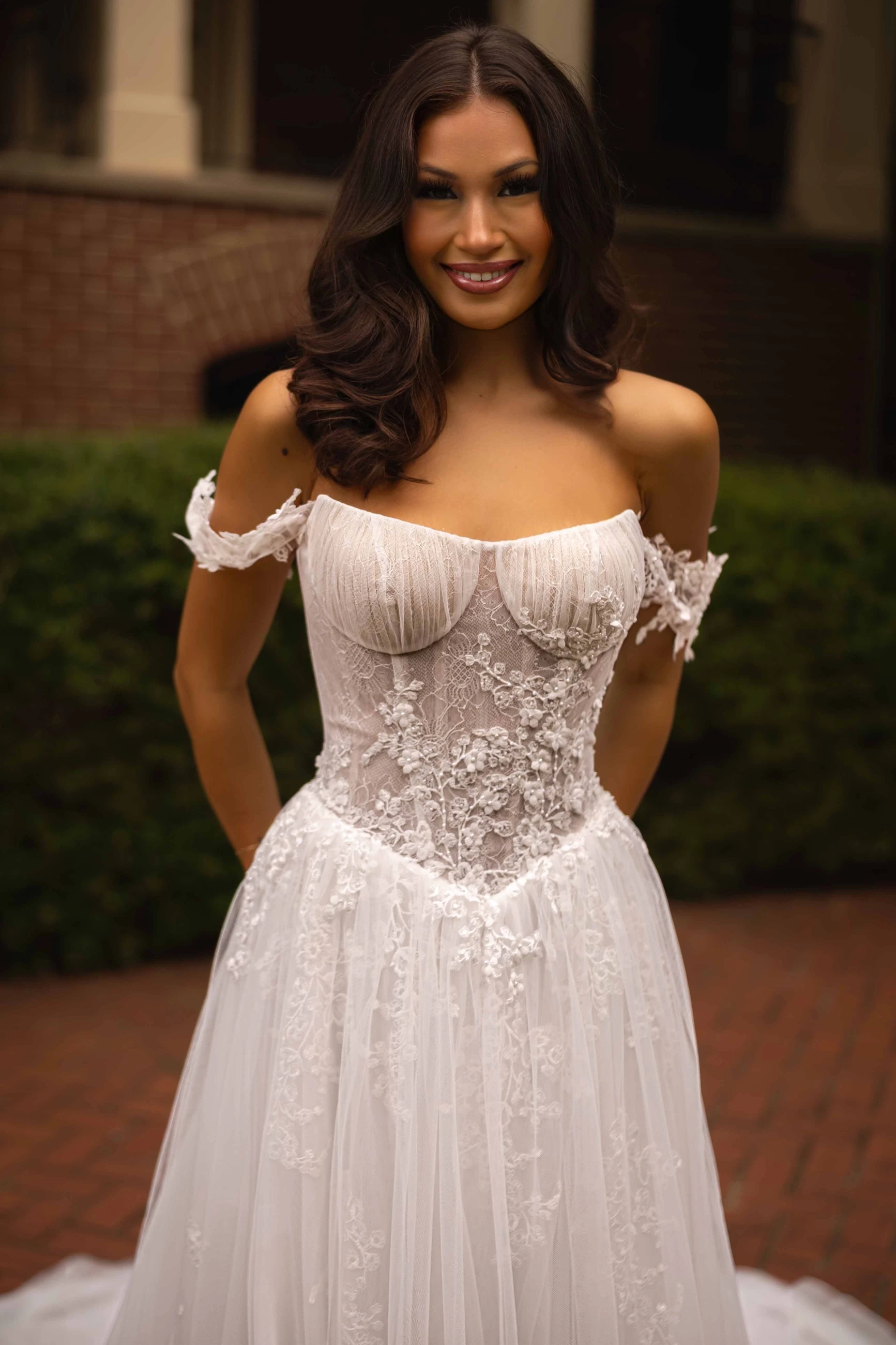 Model wearing a white dress 2027