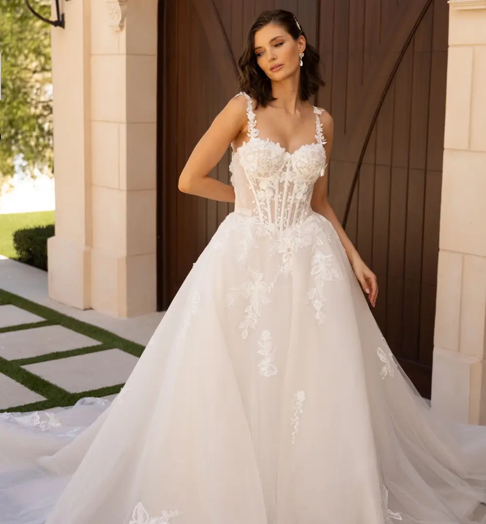 Model wearing a white dress 2025