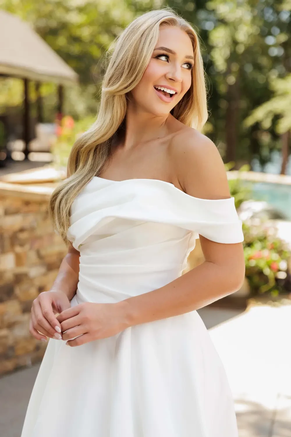 Model wearing a white dress 2025