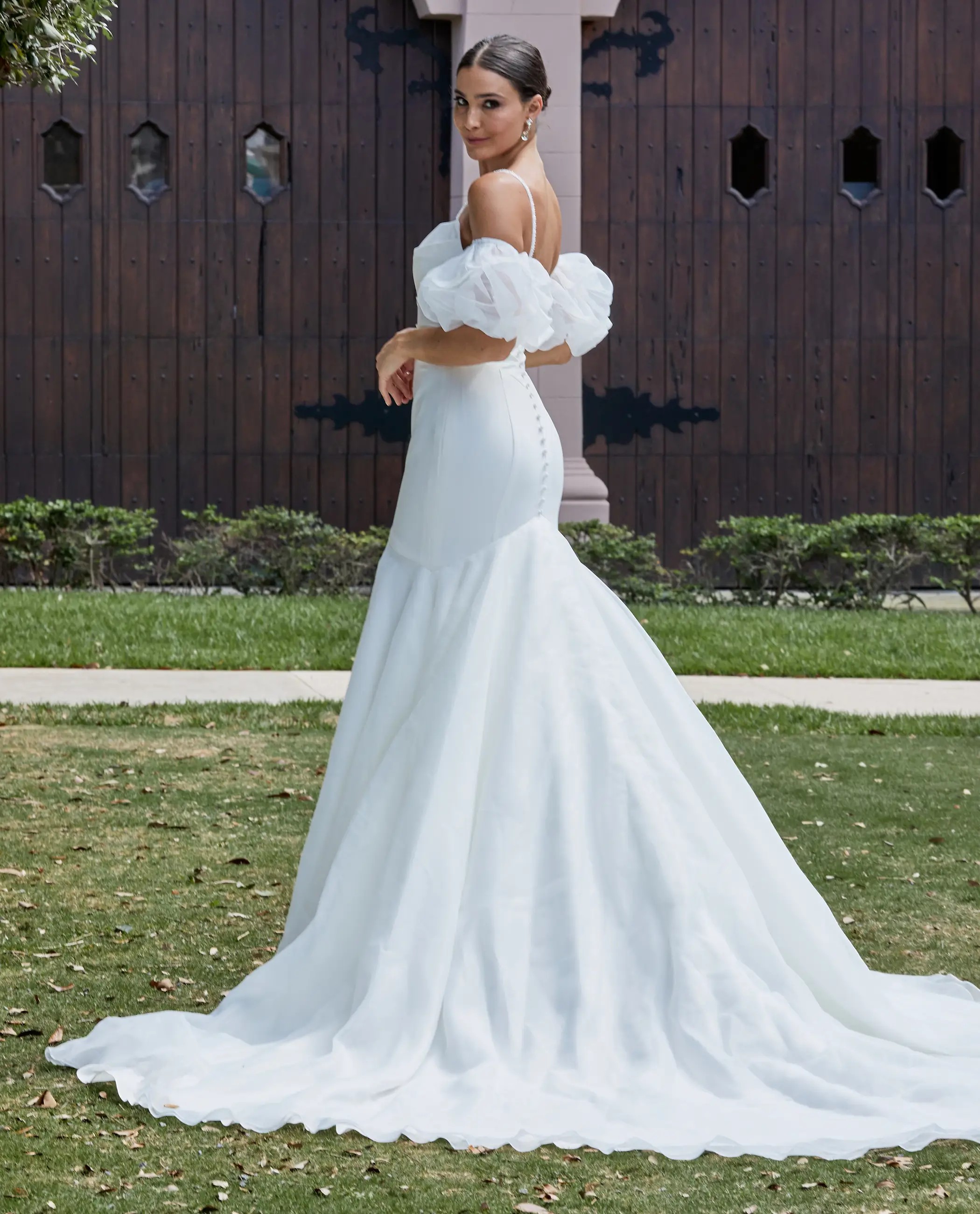 Model wearing an Sophia Thomas Brides dresses
